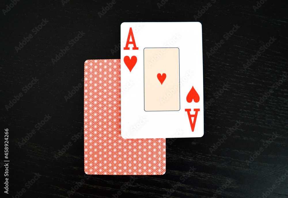 Blackjack Cards and Gambling - Lucky hand showing an ace of Hearts, symbol of luck, risk and success