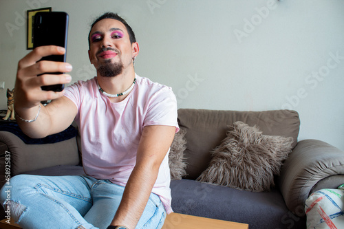 Gay Make-up Transsexual Boy Happy With Mobile At Home