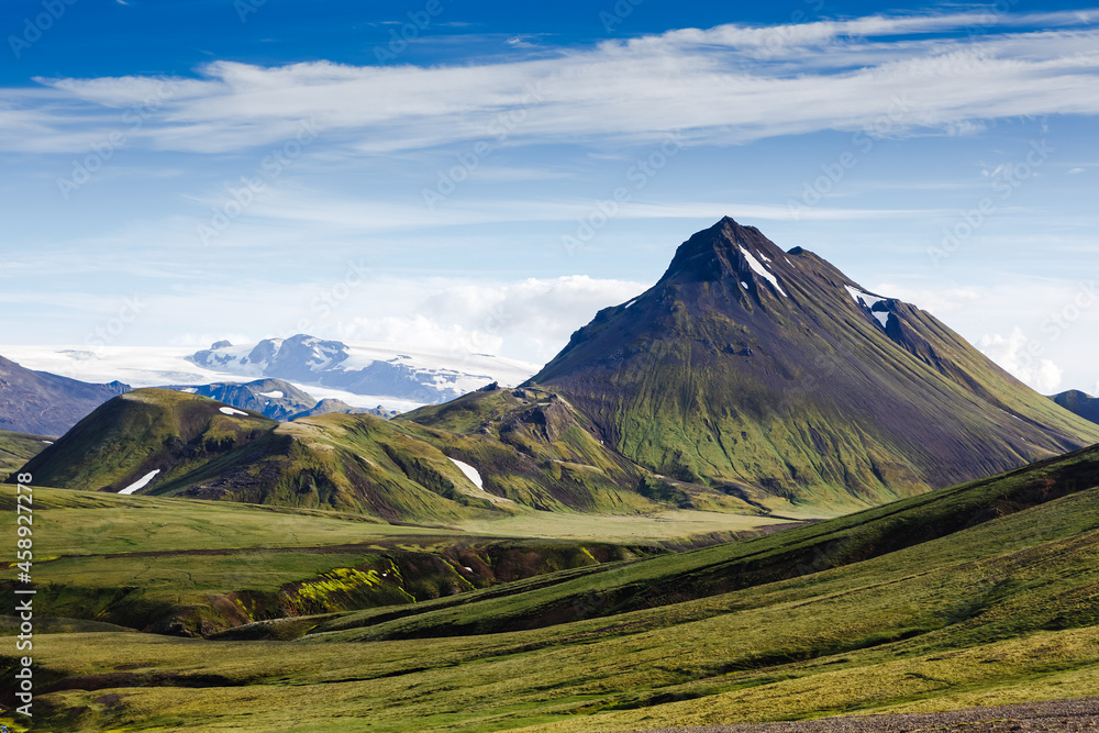 Beautiful Icelandic landscape with mountains, sky and clouds. Trekking in national park Landmannalaugar
