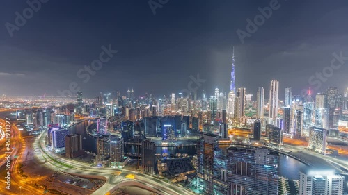 Wallpaper Mural Panoramic skyline of Dubai with business bay and downtown district night timelapse. Torontodigital.ca