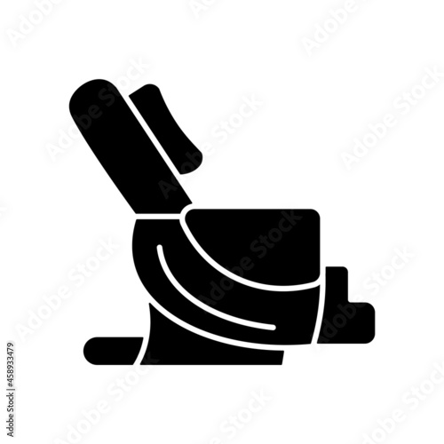 Massage chair black glyph icon. Massaging equipment. Spa salon, center. Muscle relieving. Back sore and pain reducing. Body care. Silhouette symbol on white space. Vector isolated illustration