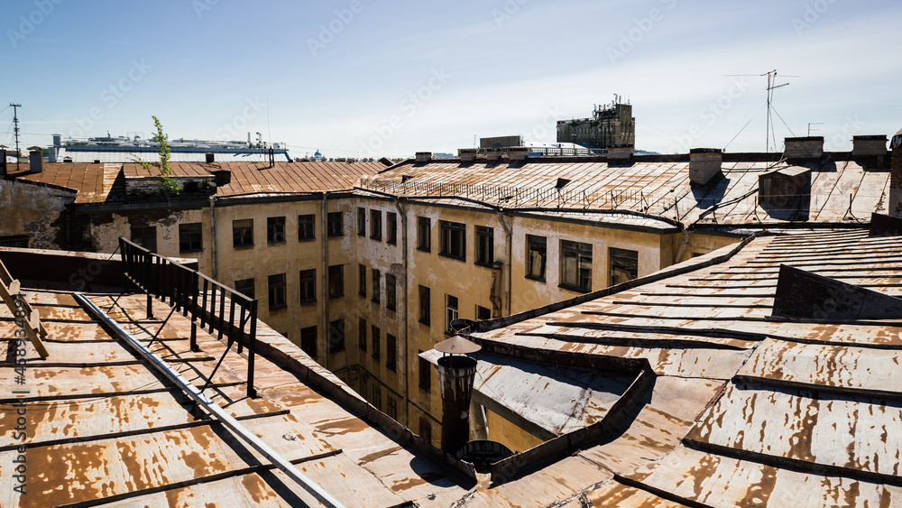 urban pitched rusty roofs. view of historic buildings. view of the city from the rooftops. rusty roofs of the city. European beautiful city