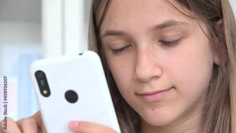 Kid Playing Smartphone, Child Browsing Internet on Phone, Teenager Girl Reading Messages, Children Searching Online on Devices Kid Playing Smartphone, Child Browsing Internet on Phone, Teenager Girl Reading Messages, Children Searching Online on Devices