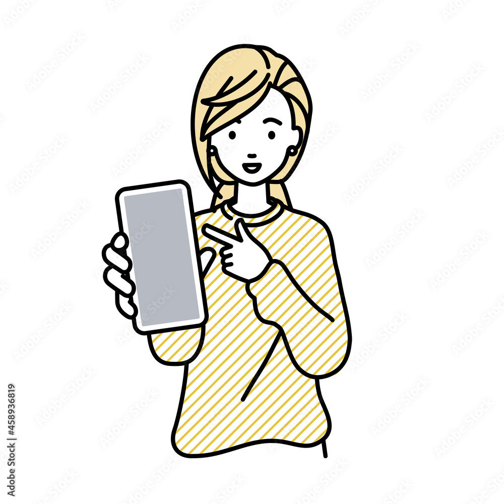 立ってスマートフォンを指差してこちらに向けて見せているリモートワークの女性 立ってスマートフォンを指差してこちらに向けて見せているリモートワークの女性