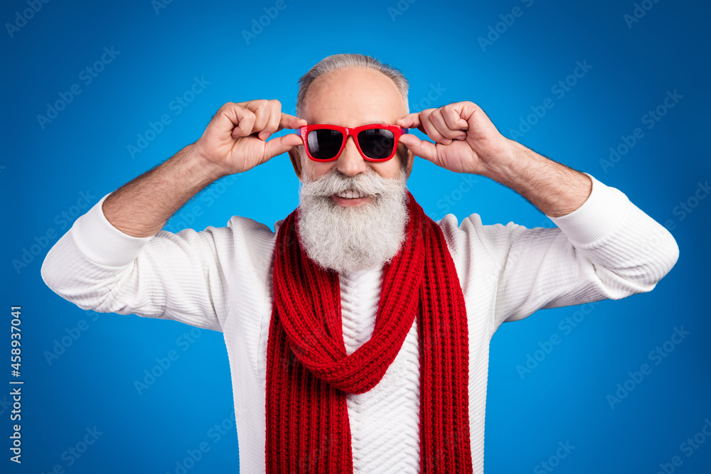 Photo of sweet funny mature man dressed white pullover arms red glasses smiling isolated blue color background
