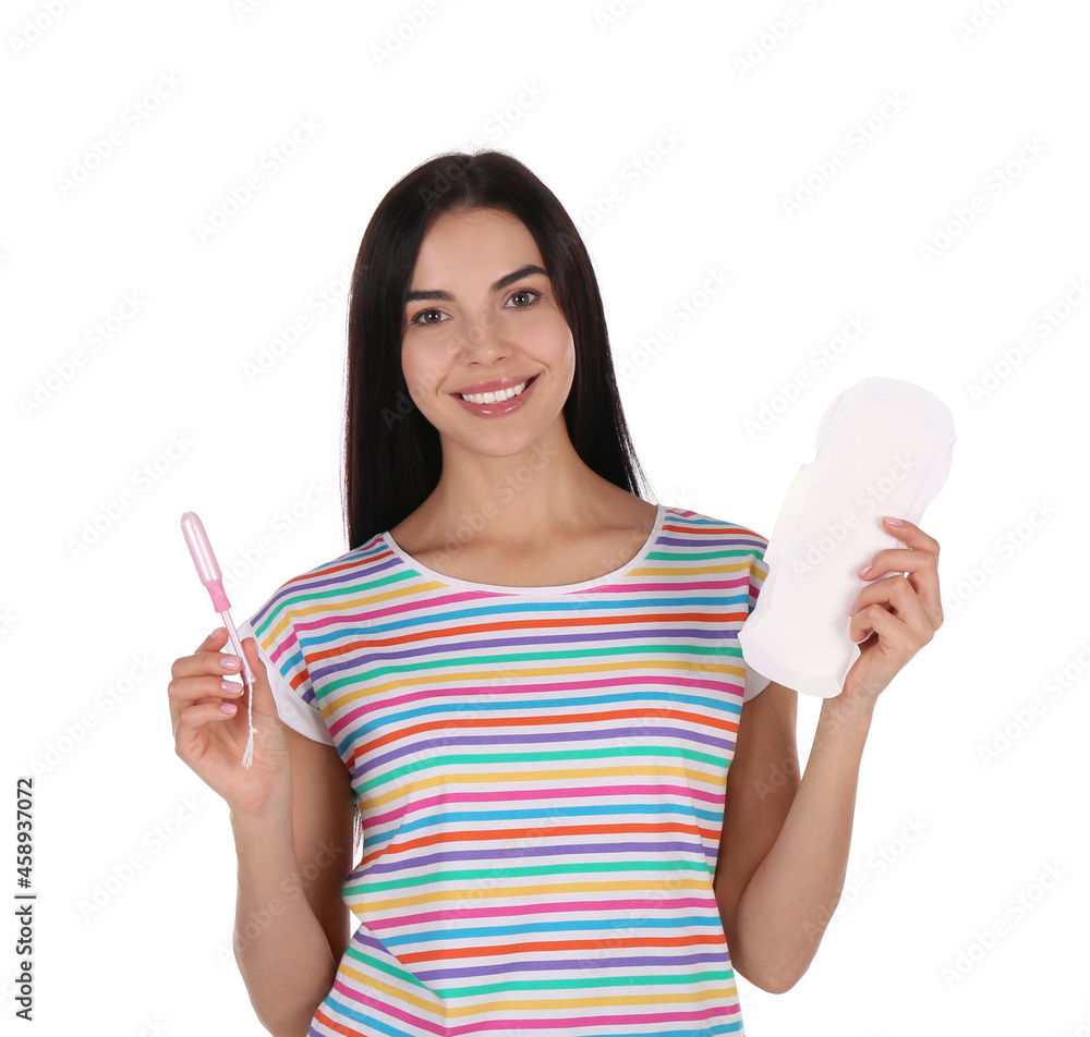Young woman with menstrual pad and tampon on white background Young woman with menstrual pad and tampon on white background
