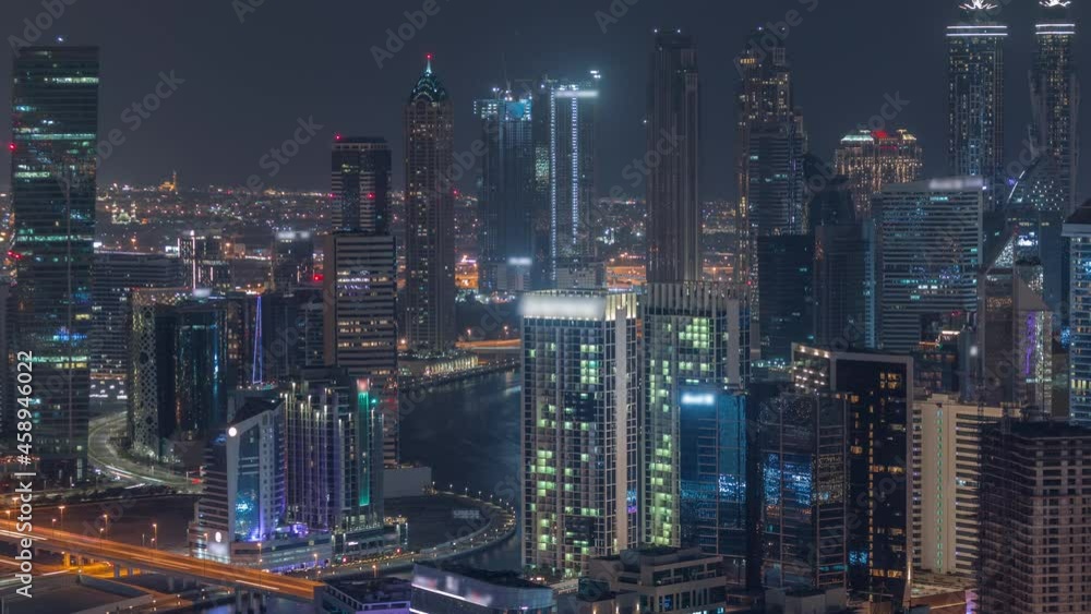 Skyline with modern architecture of Dubai business bay towers night timelapse. Aerial view Skyline with modern architecture of Dubai business bay towers night timelapse. Aerial view