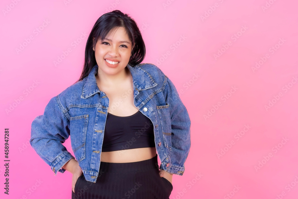 Portrait beautiful Asian fat women , fat girl , chubby, plump young woman posing on pink background , plus size fashion model body positive concept - copy space Portrait beautiful Asian fat women , fat girl , chubby, plump young woman posing on pink background , plus size fashion model body positive concept - copy space