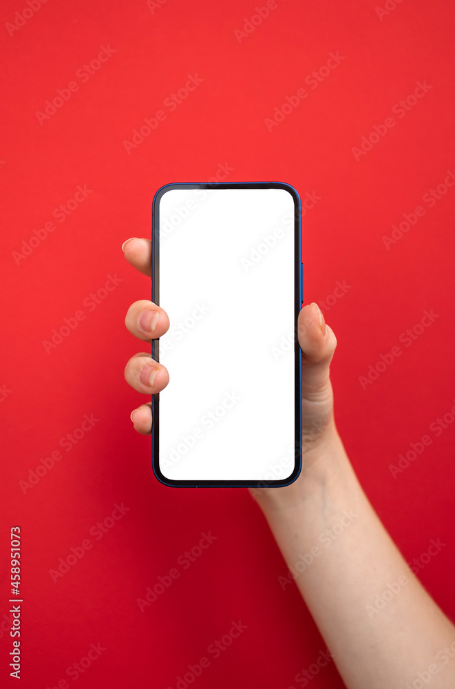 Mobile phone mockup screen on red color background, copy space photo
