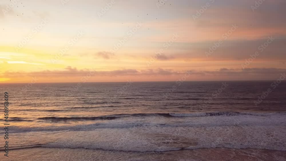 Sunset at the beach overlooking the horizon Sunset at the beach overlooking the horizon
