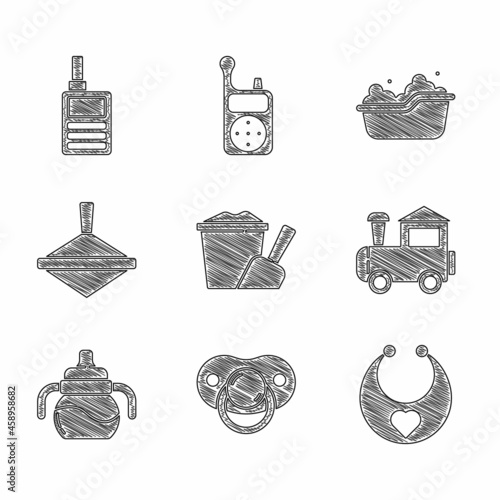 Set Sand in bucket with shovel, Baby dummy pacifier, bib, Toy train, bottle, Whirligig toy, bathtub and Monitor Walkie Talkie icon. Vector