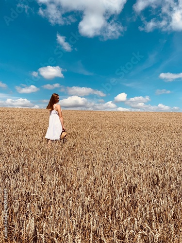 Girl in a wheat field Woman in a wheat field