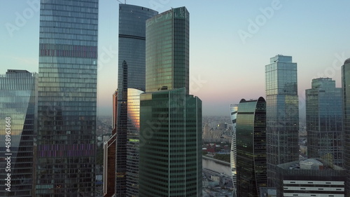 Aerial view of several glass skyscrapers