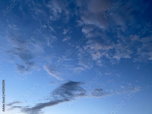 white clouds on a background of blue sky, cloud formations in the sky 2021