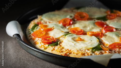 pizza with tomato and mozzarella