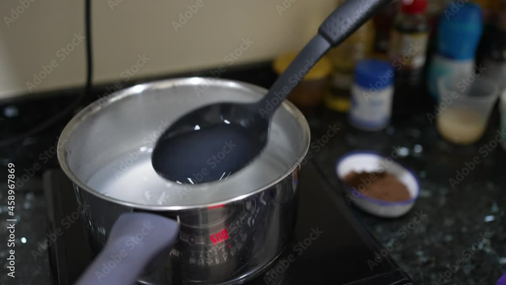 chef prepare gelatin to make dessert in kitchen chef prepare gelatin to make dessert in kitchen