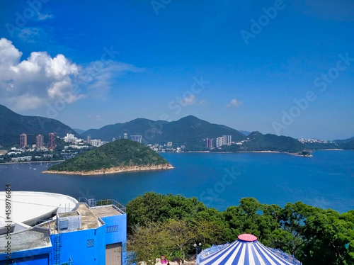 Aberdeen Channel. Coast of Hong Kong Island. Islands, sea and residential houses photo