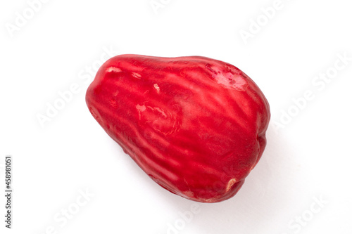 red guava fruit on a white background photo