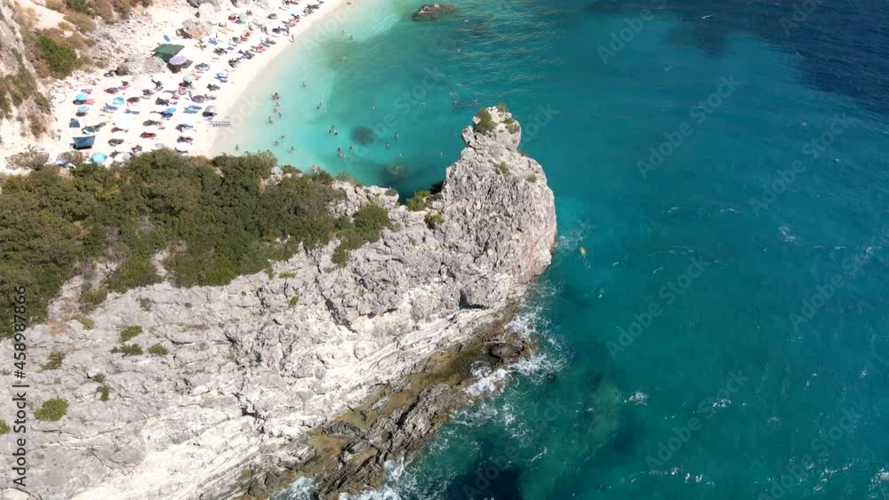 aerial view of lefkas beach at sunny summer day people sunbathing greece vacation aerial view of lefkas beach at sunny summer day people sunbathing greece vacation