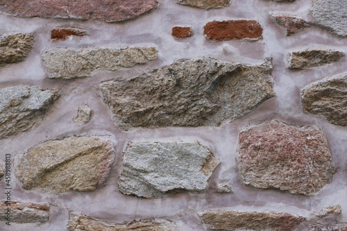 Fragment of the old facade of a house made of natural stone, Greece, Halkidiki, Arnaia photo