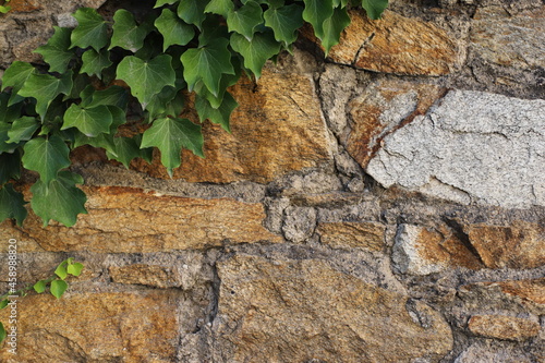 Fragment of the old facade of a house made of natural stone, Greece, Halkidiki, Arnaia photo