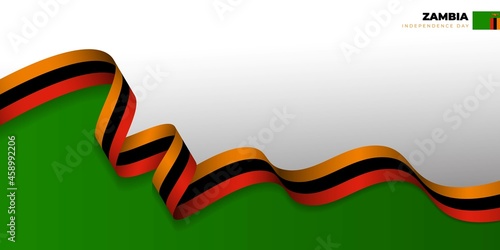 Foto Red, black, and yellow ribbon with white and green background