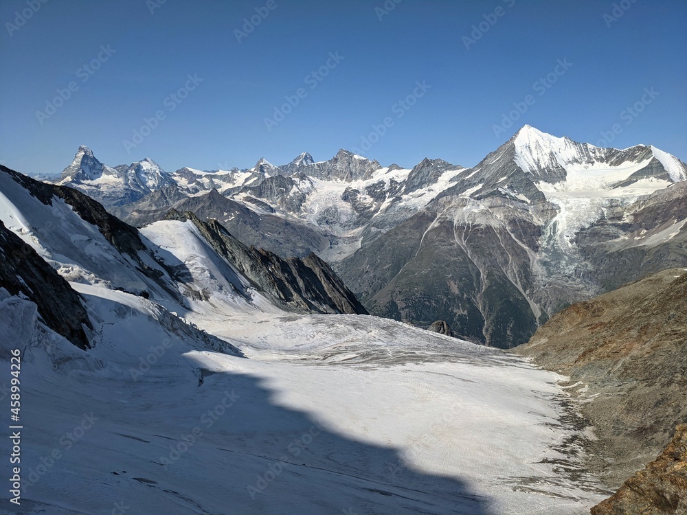 magnificent view of the valais alps with the world-famous matterhon above zermatt. mountaineering on the mountain dom magnificent view of the valais alps with the world-famous matterhon above zermatt. mountaineering on the mountain dom