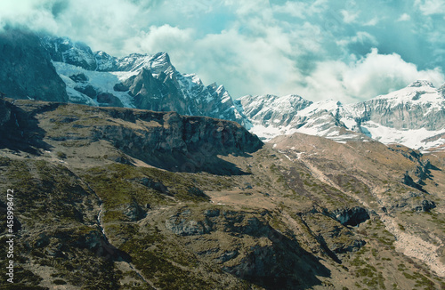 Aerial view of part of the Matterhorn Mountain range with a sight of some beautiful peaks and icy ravines in Cervinia, Aosta Valley, Italy. photo