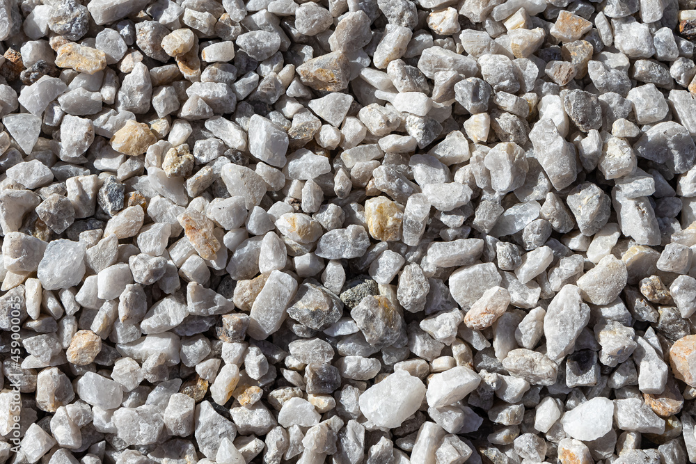Beautiful texture of transparent white quartz crystal rough stones. Natural stones and minerals Beautiful texture of transparent white quartz crystal rough stones. Natural stones and minerals