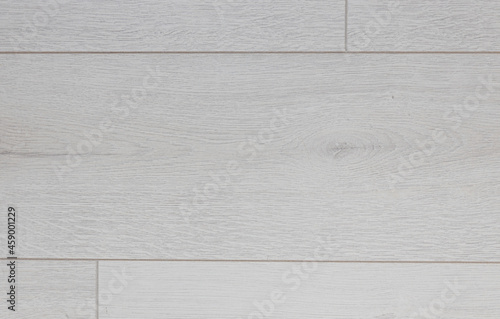 Laminate wood background. Laminate and parquet flooring in the interior. Natural wood texture and pattern.