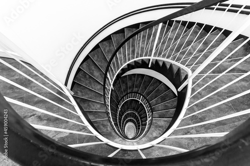 Sprial staircase forming a beautiful pattern like an open lotus flower - black and white version photo