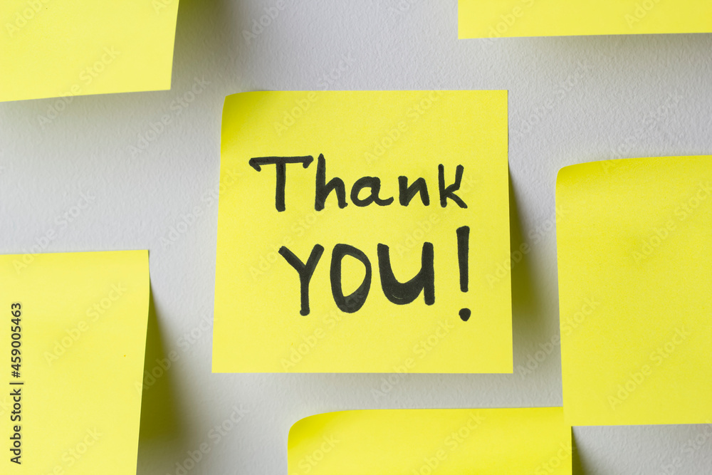 Yellow sticky note with the words Thank you. Yellow sticky note with the words Thank you.