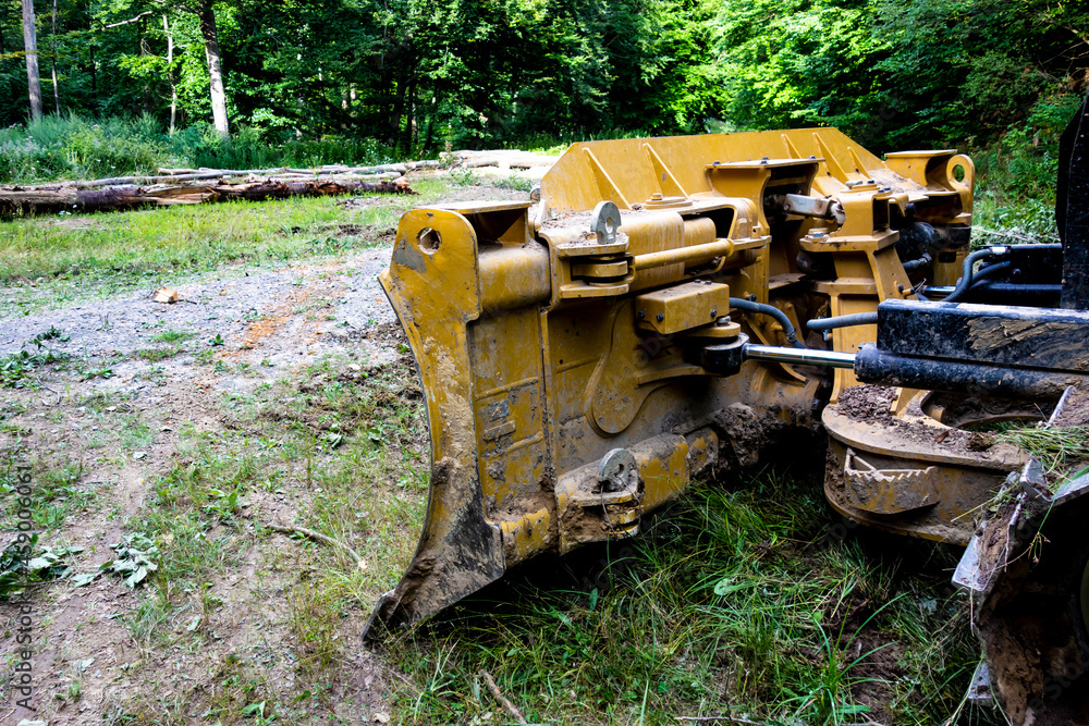 Forest tractor for logging after sawing trees, heavy forestry equipment Forest tractor for logging after sawing trees, heavy forestry equipment