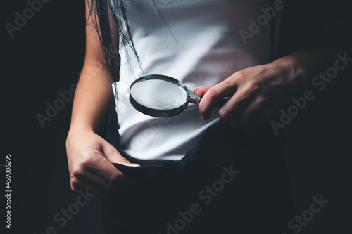 woman magnifying glass looking crotch