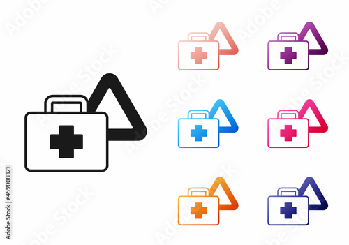 Black First aid kit and warning triangle icon isolated on white background. Must be in the car. Set icons colorful. Vector