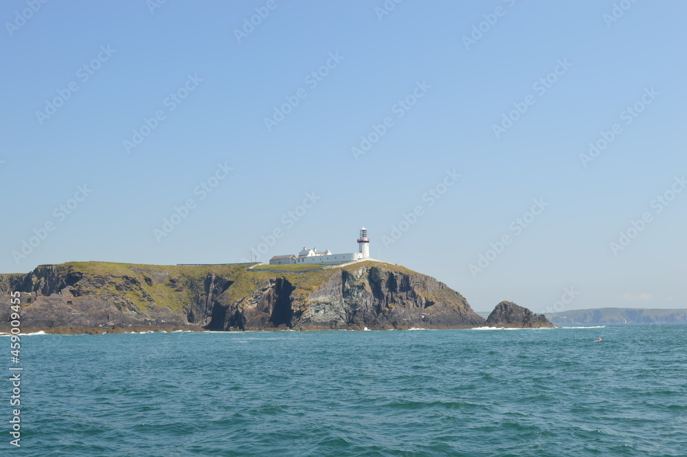 Atlantic Ocean. West Cork. Ireland. Rocks. Cliffs.  Lighthouse. Beacon.