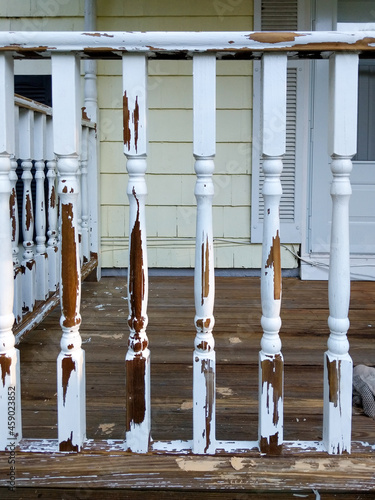 Railing and Balusters on Front Porch of House photo