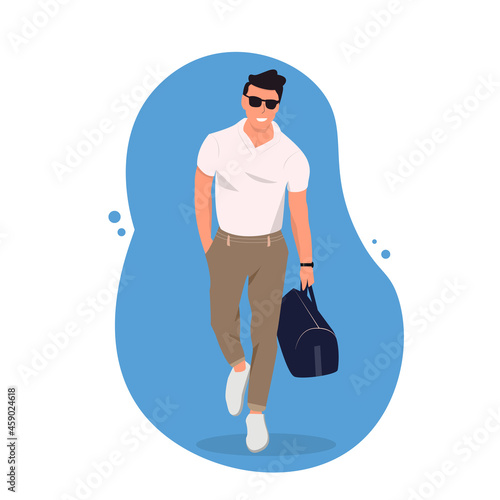 handsome young man in casual fashion clothes, sunglasses with sport bag is walking 