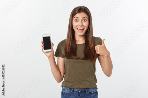 Girl Holding Smart Phone - Beautiful smiling girl holding a smart phone photo