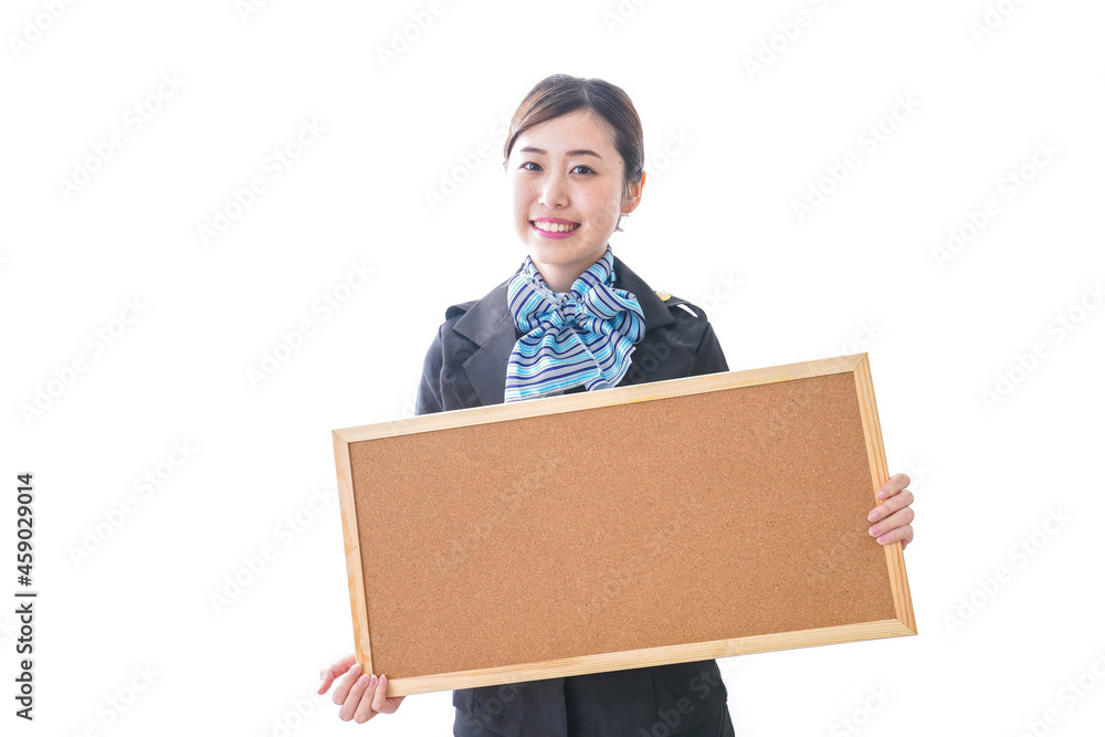 ボードを持つキャビンアテンダント