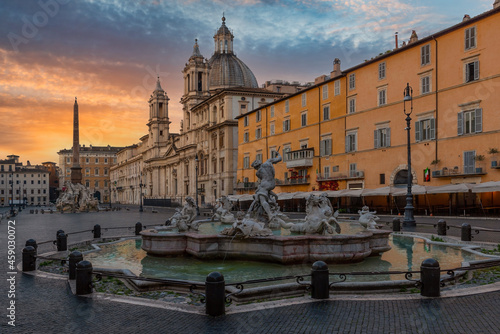 Piazza Navona, the Neptune fountain and the church of St. Agnes in the early morning 