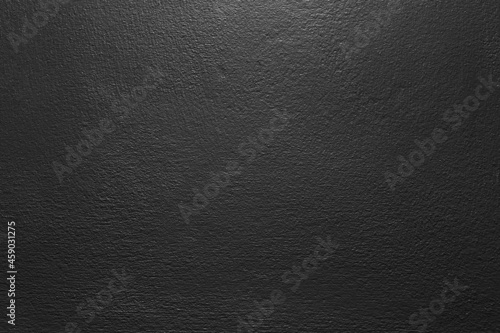 Dark black color old grunge wall concrete texture as background.