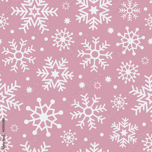 Pink snowflake seamless vector pattern. White snowflakes on a pastel background. Christmas themed, festive, winter holiday print.