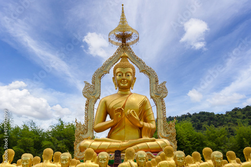 Golden Buddha with 1250 disciples statue at Makha Bucha Buddhist memorial park is built on the occasion of Great period, Nakhon Nayok
