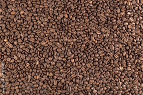 Roasted coffee beans. Food background. High quality photo