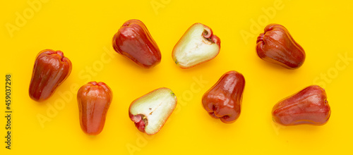 Rose apple on yellow background.