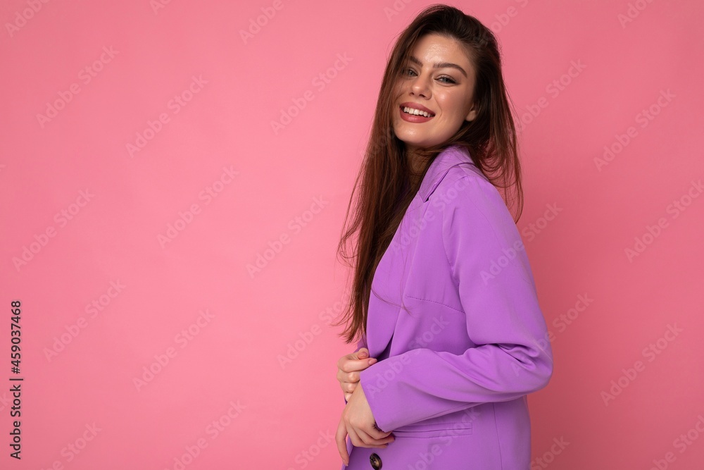 Fototapeta premium Side-profile Photo of positive young business woman wearing purple suit isolated on background. Copy space