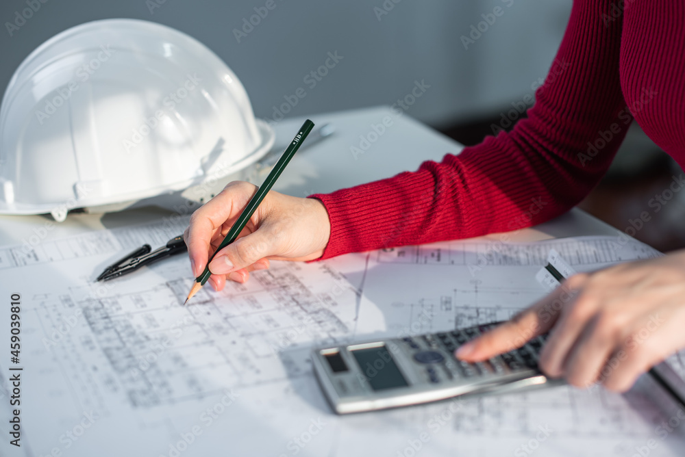 Architect working on blueprint. Architects workplace - architectural ...