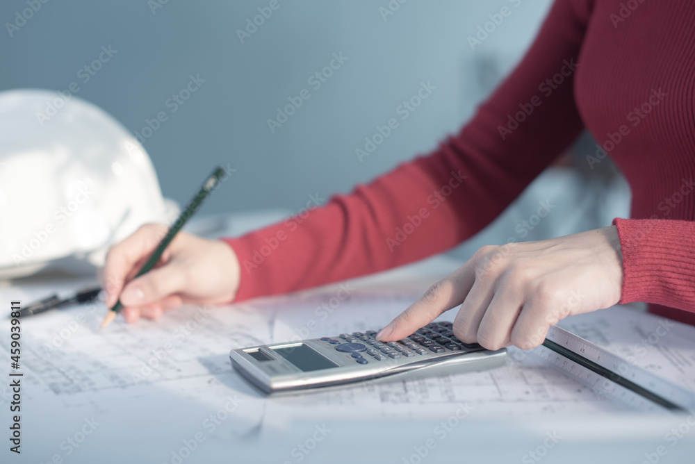Architect working on blueprint. Architects workplace - architectural ...