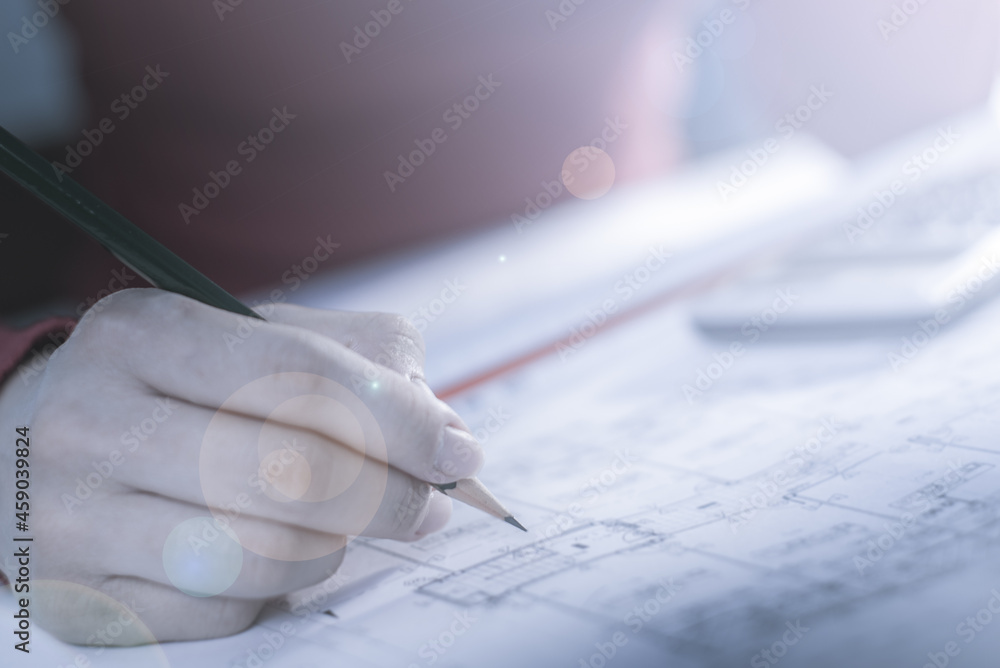 Architect working on blueprint. Architects workplace - architectural ...